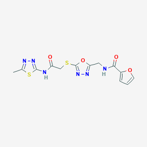 molecular formula C13H12N6O4S2 B2651021 N-[[5-[2-[(5-methyl-1,3,4-thiadiazol-2-yl)amino]-2-oxoethyl]sulfanyl-1,3,4-oxadiazol-2-yl]methyl]furan-2-carboxamide CAS No. 851862-07-2