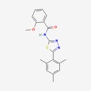 molecular formula C19H19N3O2S B2651195 2-methoxy-N-[5-(2,4,6-trimethylphenyl)-1,3,4-thiadiazol-2-yl]benzamide CAS No. 391226-84-9