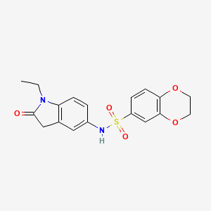 molecular formula C18H18N2O5S B2652698 N-(1-ethyl-2-oxoindolin-5-yl)-2,3-dihydrobenzo[b][1,4]dioxine-6-sulfonamide CAS No. 921786-75-6