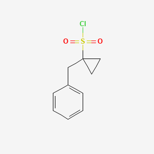 molecular formula C10H11ClO2S B2653006 1-Benzylcyclopropane-1-sulfonyl chloride CAS No. 1824462-35-2