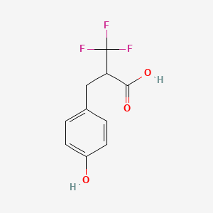 molecular formula C10H9F3O3 B2653011 3,3,3-三氟-2-[(4-羟基苯基)甲基]丙酸 CAS No. 1890024-84-6