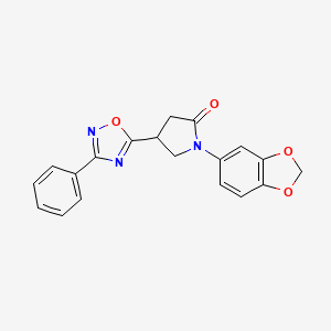 molecular formula C19H15N3O4 B2653432 1-(Benzo[d][1,3]dioxol-5-yl)-4-(3-phenyl-1,2,4-oxadiazol-5-yl)pyrrolidin-2-one CAS No. 946254-38-2