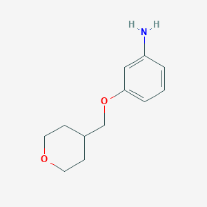 molecular formula C12H17NO2 B2653820 3-[(四氢-2H-吡喃-4-基)甲氧基]苯胺 CAS No. 1211824-69-9
