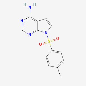 molecular formula C13H12N4O2S B2655248 7-[(4-Methylbenzene)sulfonyl]pyrrolo[2,3-d]pyrimidin-4-amine CAS No. 2173107-06-5