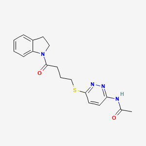 molecular formula C18H20N4O2S B2655988 N-(6-((4-(indolin-1-yl)-4-oxobutyl)thio)pyridazin-3-yl)acetamide CAS No. 1105247-70-8