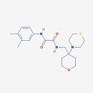 N'-(3,4-Dimethylphenyl)-N-[(4-thiomorpholin-4-yloxan-4-yl)methyl]oxamide