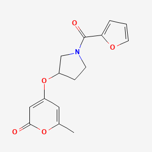 molecular formula C15H15NO5 B2658007 4-((1-(呋喃-2-羰基)吡咯烷-3-基)氧基)-6-甲基-2H-吡喃-2-酮 CAS No. 1706221-81-9