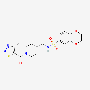 molecular formula C18H22N4O5S2 B2659312 N-((1-(4-methyl-1,2,3-thiadiazole-5-carbonyl)piperidin-4-yl)methyl)-2,3-dihydrobenzo[b][1,4]dioxine-6-sulfonamide CAS No. 1235347-27-9