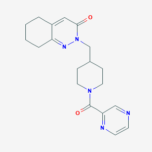 molecular formula C19H23N5O2 B2659335 2-{[1-(Pyrazine-2-carbonyl)piperidin-4-yl]methyl}-2,3,5,6,7,8-hexahydrocinnolin-3-one CAS No. 2097915-15-4