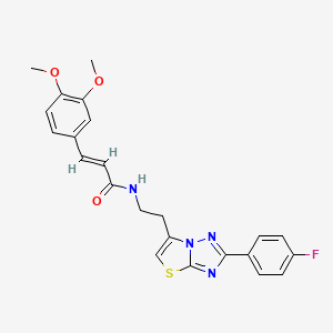 molecular formula C23H21FN4O3S B2660620 (E)-3-(3,4-dimethoxyphenyl)-N-(2-(2-(4-fluorophenyl)thiazolo[3,2-b][1,2,4]triazol-6-yl)ethyl)acrylamide CAS No. 894030-06-9