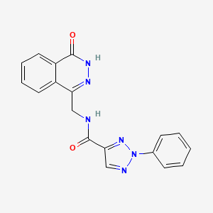 molecular formula C18H14N6O2 B2660820 N-[(4-oxo-3H-phthalazin-1-yl)methyl]-2-phenyltriazole-4-carboxamide CAS No. 1207029-58-0