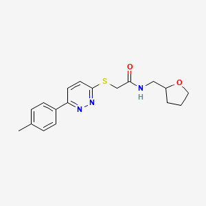 molecular formula C18H21N3O2S B2661897 2-[[6-(p-tolyl)pyridazin-3-yl]thio]-N-(tetrahydrofurfuryl)acetamide CAS No. 872694-73-0