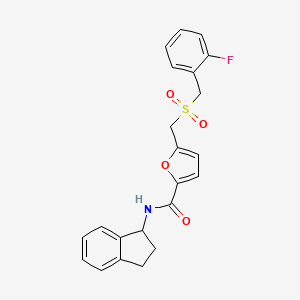 N-(2,3-dihydro-1H-inden-1-yl)-5-(((2-fluorobenzyl)sulfonyl)methyl)furan-2-carboxamide