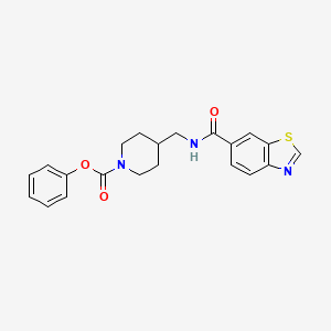 molecular formula C21H21N3O3S B2664178 Phenyl 4-((benzo[d]thiazole-6-carboxamido)methyl)piperidine-1-carboxylate CAS No. 1797213-34-3