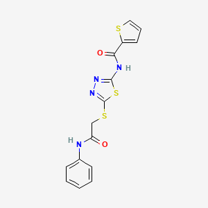 molecular formula C15H12N4O2S3 B2664289 N-[5-(2-anilino-2-oxoethyl)sulfanyl-1,3,4-thiadiazol-2-yl]thiophene-2-carboxamide CAS No. 392290-77-6