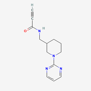 molecular formula C13H16N4O B2664569 N-[(1-Pyrimidin-2-ylpiperidin-3-yl)methyl]prop-2-ynamide CAS No. 2305479-16-5