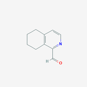 molecular formula C10H11NO B2664911 5,6,7,8-四氢异喹啉-1-甲醛 CAS No. 185220-65-9