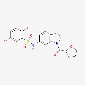 molecular formula C19H18F2N2O4S B2665529 2,5-二氟-N-(1-(环丁烷-2-甲酰)吲哚-6-基)苯磺酰胺 CAS No. 1060190-12-6