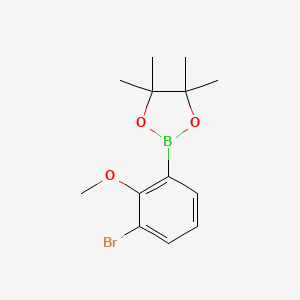 molecular formula C13H18BBrO3 B2665877 2-(3-溴-2-甲氧基苯基)-4,4,5,5-四甲基-1,3,2-二氧杂硼杂环己烷 CAS No. 2096997-23-6