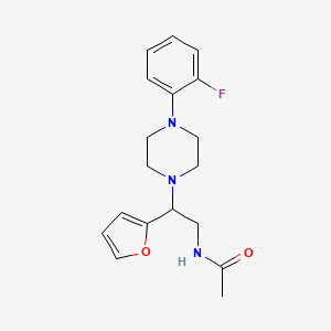 molecular formula C18H22FN3O2 B2666216 N-(2-(4-(2-fluorophenyl)piperazin-1-yl)-2-(furan-2-yl)ethyl)acetamide CAS No. 877633-32-4