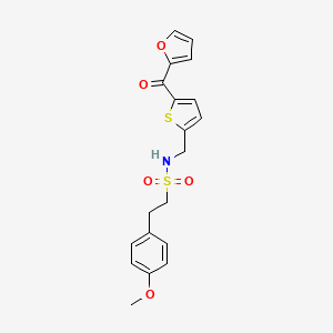 B2666911 N-((5-(furan-2-carbonyl)thiophen-2-yl)methyl)-2-(4-methoxyphenyl)ethanesulfonamide CAS No. 1797299-45-6