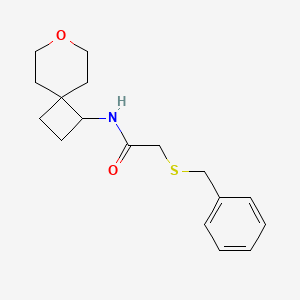 molecular formula C17H23NO2S B2668021 2-(benzylthio)-N-(7-oxaspiro[3.5]nonan-1-yl)acetamide CAS No. 2189434-55-5