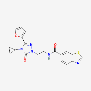 molecular formula C19H17N5O3S B2669099 N-(2-(4-cyclopropyl-3-(furan-2-yl)-5-oxo-4,5-dihydro-1H-1,2,4-triazol-1-yl)ethyl)benzo[d]thiazole-6-carboxamide CAS No. 1797847-01-8