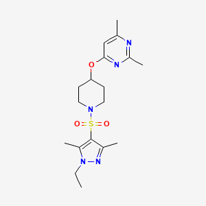 molecular formula C18H27N5O3S B2669303 4-((1-((1-ethyl-3,5-dimethyl-1H-pyrazol-4-yl)sulfonyl)piperidin-4-yl)oxy)-2,6-dimethylpyrimidine CAS No. 2034617-96-2