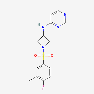 molecular formula C14H15FN4O2S B2669399 N-[1-(4-氟-3-甲基苯基磺酰)吖唑-3-基]嘧啶-4-胺 CAS No. 2097919-95-2