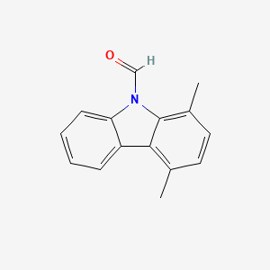 molecular formula C15H13NO B2671131 1,4-dimethyl-9H-carbazole-9-carbaldehyde CAS No. 861207-74-1