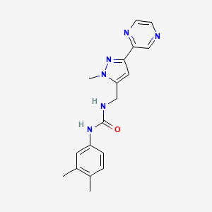 molecular formula C18H20N6O B2672016 1-(3,4-dimethylphenyl)-3-((1-methyl-3-(pyrazin-2-yl)-1H-pyrazol-5-yl)methyl)urea CAS No. 2034508-86-4