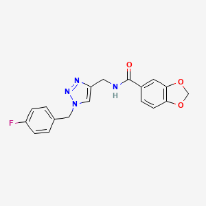 N-[[1-[(4-Fluorophenyl)methyl]triazol-4-yl]methyl]-1,3-benzodioxole-5-carboxamide