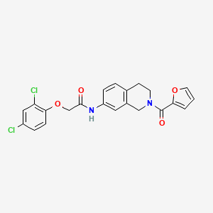 2-(2,4-dichlorophenoxy)-N-(2-(furan-2-carbonyl)-1,2,3,4-tetrahydroisoquinolin-7-yl)acetamide