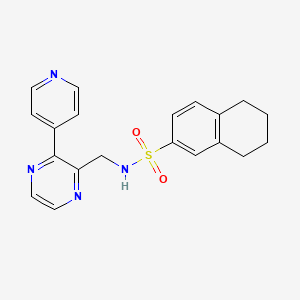 molecular formula C20H20N4O2S B2672629 N-{[3-(pyridin-4-yl)pyrazin-2-yl]methyl}-5,6,7,8-tetrahydronaphthalene-2-sulfonamide CAS No. 2097860-08-5