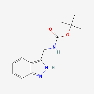 molecular formula C13H17N3O2 B2673083 tert-butyl N-(1H-indazol-3-ylmethyl)carbamate CAS No. 2387600-26-0