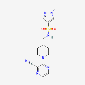 molecular formula C15H19N7O2S B2673395 N-((1-(3-cyanopyrazin-2-yl)piperidin-4-yl)methyl)-1-methyl-1H-pyrazole-4-sulfonamide CAS No. 1797219-21-6