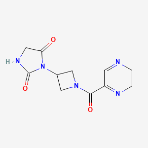 molecular formula C11H11N5O3 B2673466 3-(1-(Pyrazine-2-carbonyl)azetidin-3-yl)imidazolidine-2,4-dione CAS No. 2034317-07-0