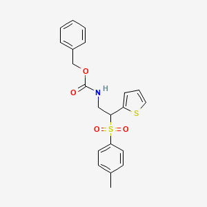 molecular formula C21H21NO4S2 B2674284 Benzyl (2-(thiophen-2-yl)-2-tosylethyl)carbamate CAS No. 896343-62-7