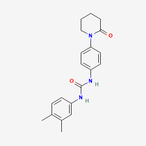 molecular formula C20H23N3O2 B2674504 1-(3,4-Dimethylphenyl)-3-[4-(2-oxopiperidin-1-yl)phenyl]urea CAS No. 1206994-69-5