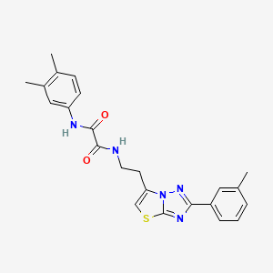 molecular formula C23H23N5O2S B2676155 N1-(3,4-dimethylphenyl)-N2-(2-(2-(m-tolyl)thiazolo[3,2-b][1,2,4]triazol-6-yl)ethyl)oxalamide CAS No. 894040-34-7
