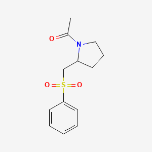 molecular formula C13H17NO3S B2677022 1-(2-((Phenylsulfonyl)methyl)pyrrolidin-1-yl)ethanone CAS No. 1704617-12-8