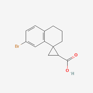 molecular formula C13H13BrO2 B2677553 6-Bromospiro[2,3-dihydro-1H-naphthalene-4,2'-cyclopropane]-1'-carboxylic acid CAS No. 1784950-81-7