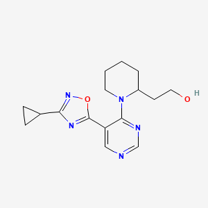 2-{1-[5-(3-Cyclopropyl-1,2,4-oxadiazol-5-yl)pyrimidin-4-yl]piperidin-2-yl}ethanol