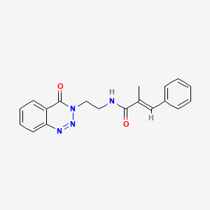 B2677695 (E)-2-methyl-N-(2-(4-oxobenzo[d][1,2,3]triazin-3(4H)-yl)ethyl)-3-phenylacrylamide CAS No. 2035003-68-8