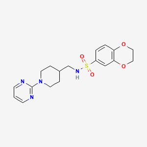 molecular formula C18H22N4O4S B2677737 N-((1-(pyrimidin-2-yl)piperidin-4-yl)methyl)-2,3-dihydrobenzo[b][1,4]dioxine-6-sulfonamide CAS No. 1235060-78-2