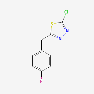 2-Chloro-5-[(4-fluorophenyl)methyl]-1,3,4-thiadiazole