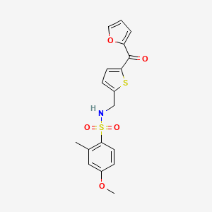 molecular formula C18H17NO5S2 B2678828 N-((5-(furan-2-carbonyl)thiophen-2-yl)methyl)-4-methoxy-2-methylbenzenesulfonamide CAS No. 1797141-04-8