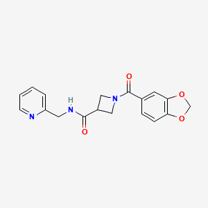 molecular formula C18H17N3O4 B2678866 1-(benzo[d][1,3]dioxole-5-carbonyl)-N-(pyridin-2-ylmethyl)azetidine-3-carboxamide CAS No. 1396758-44-3