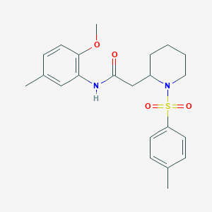 N-(2-methoxy-5-methylphenyl)-2-(1-tosylpiperidin-2-yl)acetamide