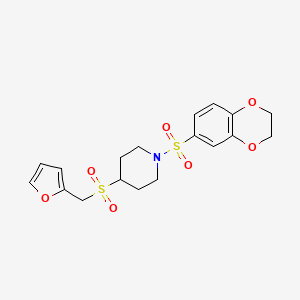 molecular formula C18H21NO7S2 B2684113 1-((2,3-Dihydrobenzo[b][1,4]dioxin-6-yl)sulfonyl)-4-((furan-2-ylmethyl)sulfonyl)piperidine CAS No. 1795357-95-7